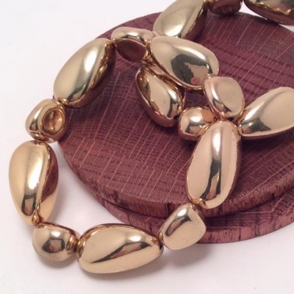 Pair Of Gold Stone Shaped Stretchy Bracelets - Picture 1 of 2